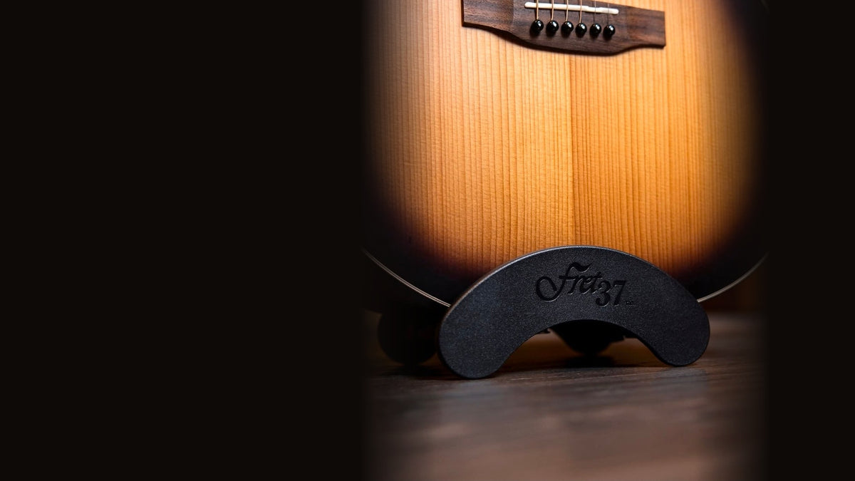 Fret37 Acoustic S1 under a sunburst acoustic guitar